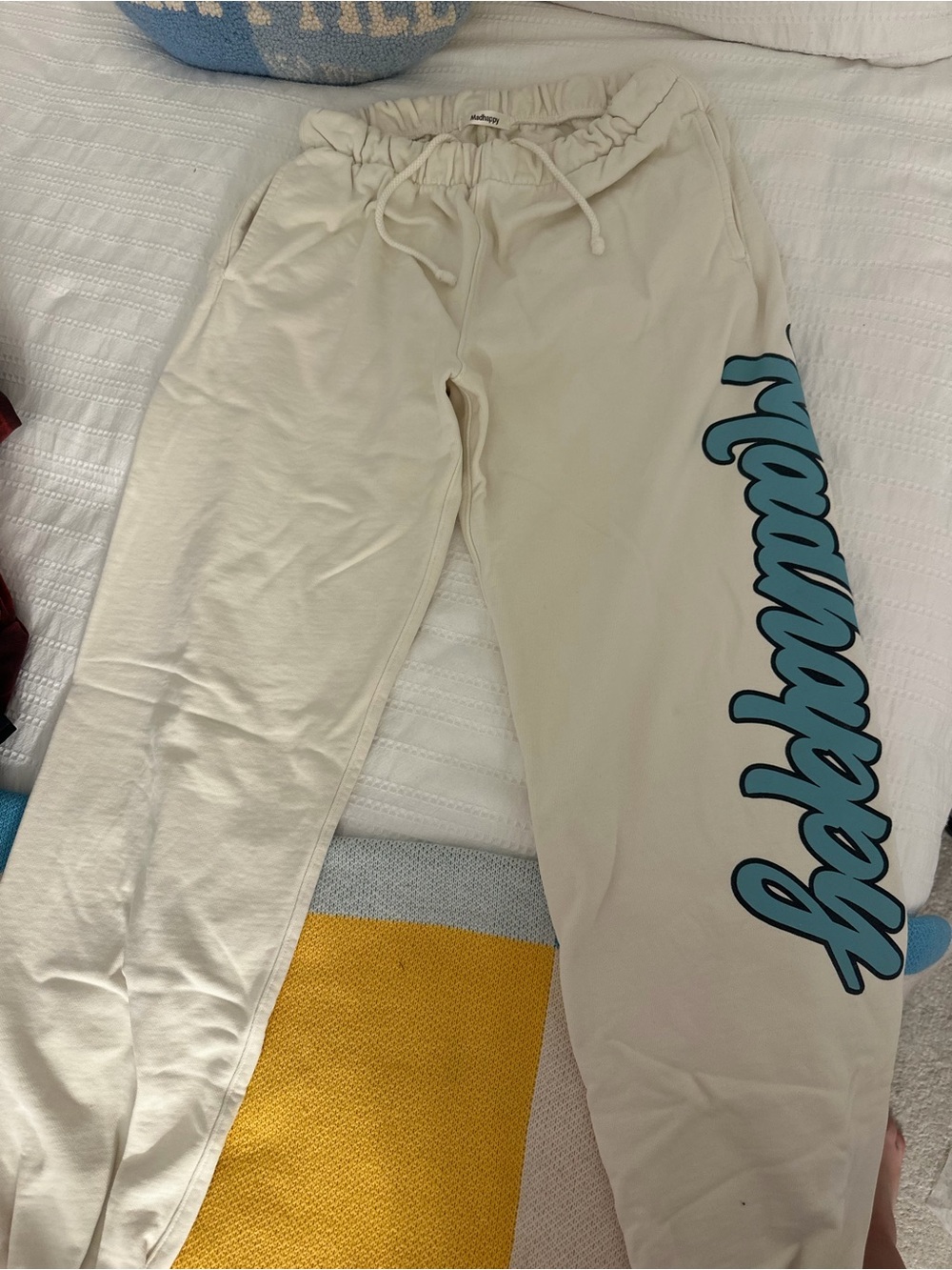 Madhappy Cream Sweatpants with Blue Script Logo